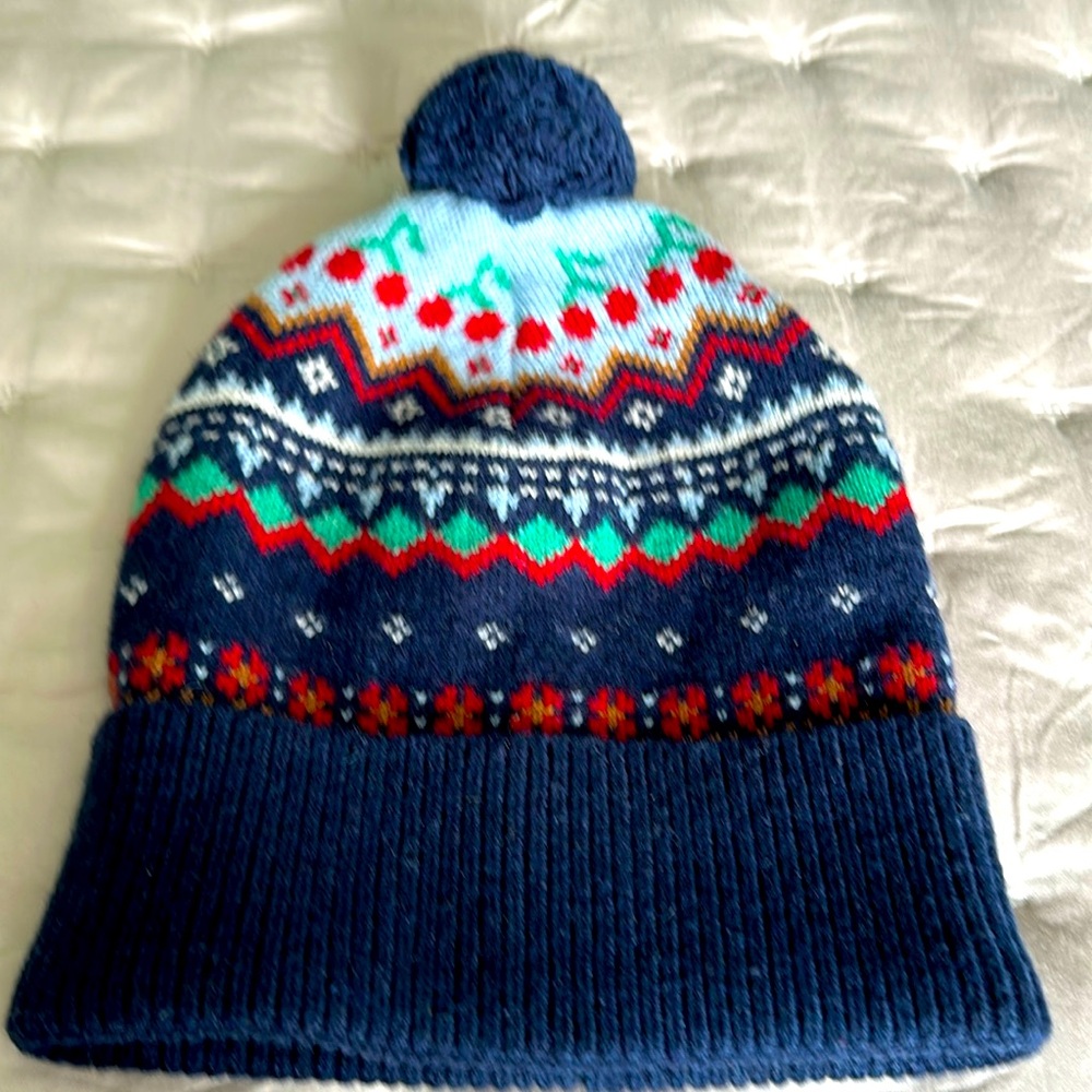 Adorable winter hat. Never worn! Pom pom/ cherry design 🍒💙